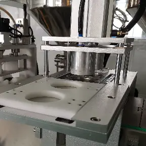 automatic capping and pressing.jpg