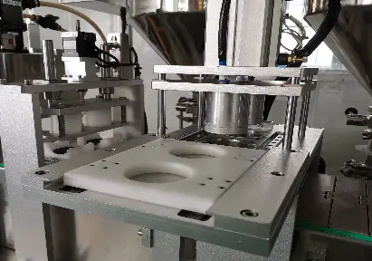 automatic capping and pressing
